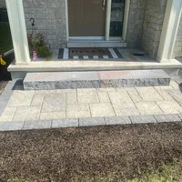 Stone landing and steps at a front entry